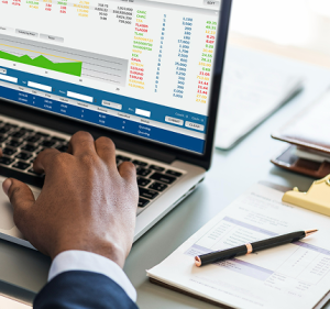 professional hand working on analytics and sheet data on laptop | Impact of the Finance Act 2023 Ruling | CFOD Hub news and articles
