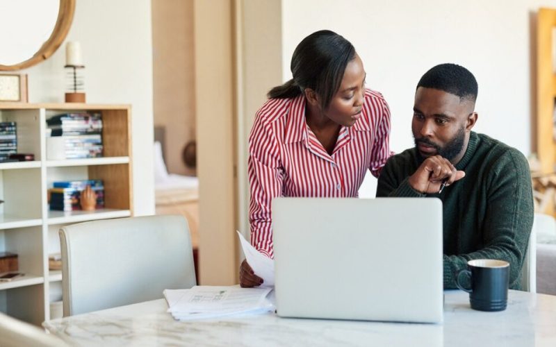 stock-photo-young-african-american-couple-going-over-bills-and-doing-some-online-banking-with-a-laptop-at-their-1736393729-transformed (1)